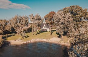 Watermark Usedom - Ferienhaus Woge - Traumhaus direkt am Wasser