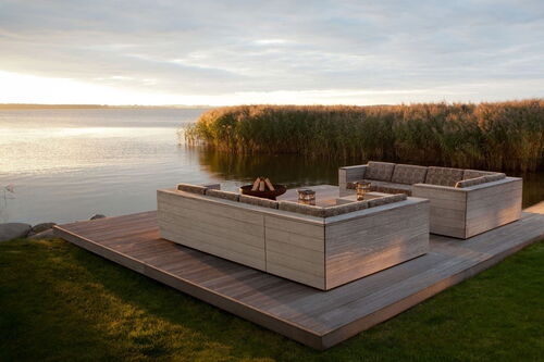 Ferienhaus Peeneblick - Sitzbereich am Wasser